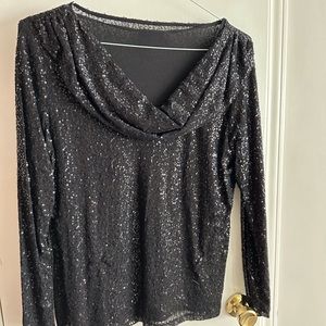 Really pretty and classic sequined top. Worn once. Lined.